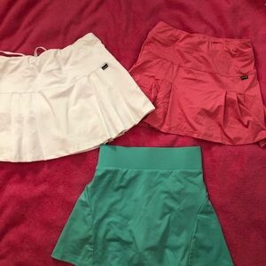 Set of Three Tennis Skirts in White, Coral, and Teal